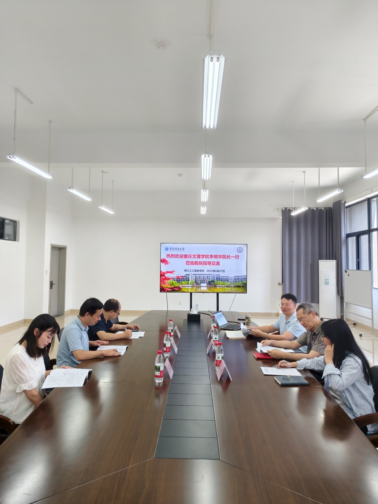 wAvd_1751532190245047258.jpg 李明华副经理带队赴重庆理工大学交流考察.jpg